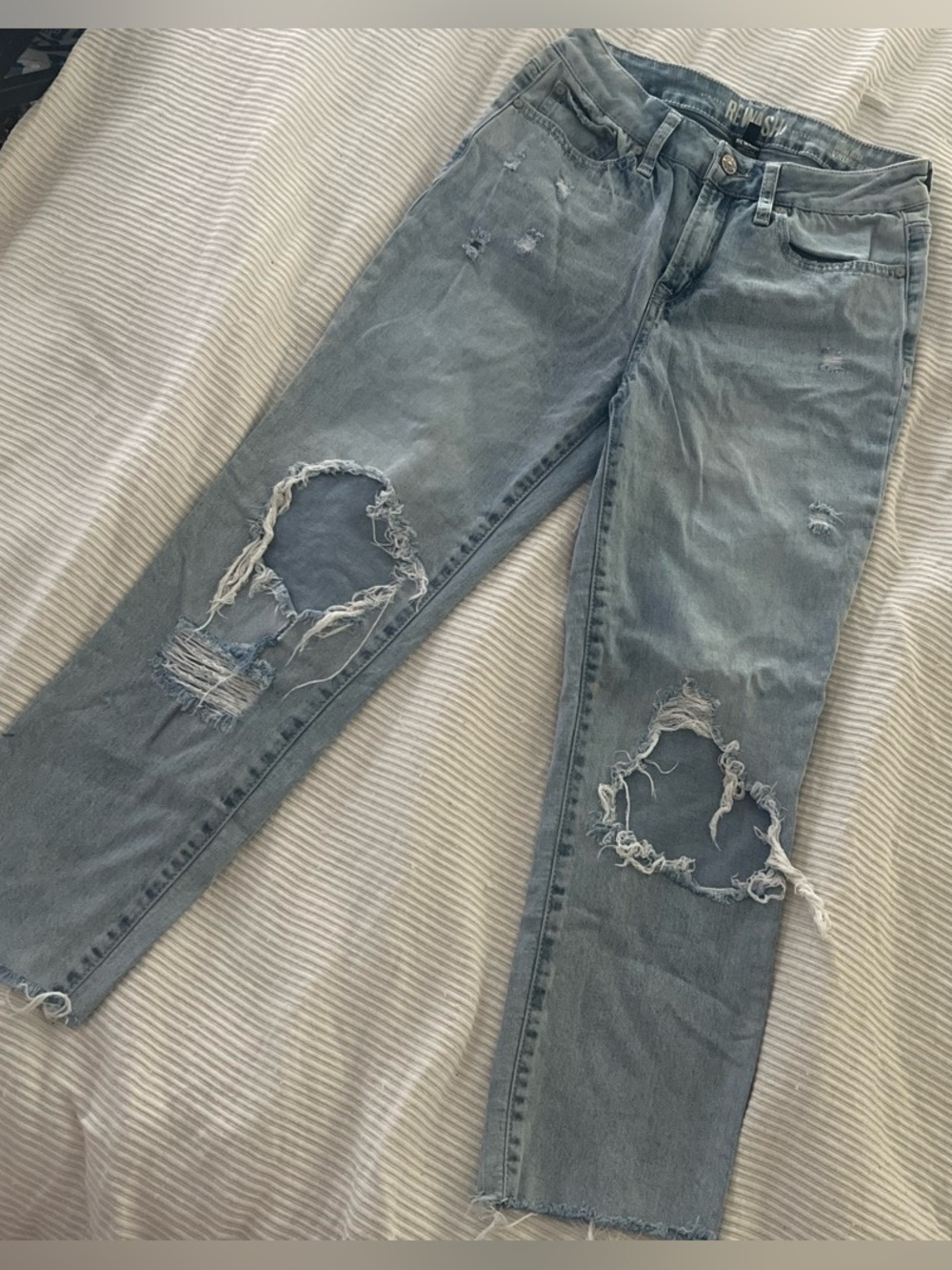 Distressed vintage wash jeans